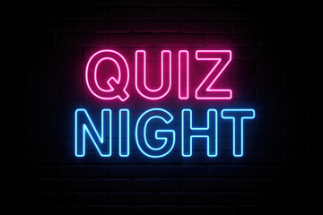 Neon sign spelling QUIZ NIGHT in pink and blue against a brick wall quiz night text