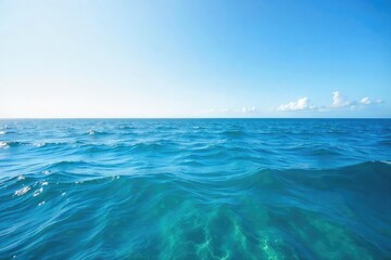Obraz premium Vast expanse of deep blue ocean water, waves gently rolling under a clear sky Perfect for travel, nature, or environmental themes , ecology, sun, marine life