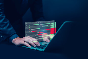 Businessman working on laptop with digital project management dashboard, concept of progress tracking, workflow planning, data analysis, productivity, task management, corporate performance report.