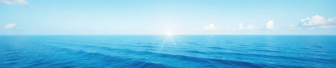 Obraz premium Vast, calm ocean stretching to the horizon under a clear sky Perfect for travel, serenity, and nature themes Ideal for website banners and desktop backgrounds , seaside, serenity, coastal