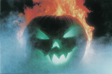 Burning pumpkin with human face, green flames, fading into black background