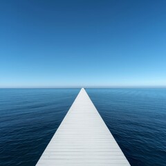 Obraz premium A minimalist and serene landscape featuring a long, white wooden pier extending directly from the foreground into the deep blue ocean. 