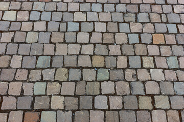 Old cobblestone pavement in the old town