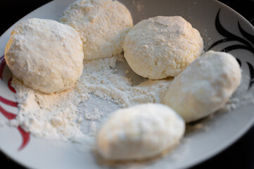 Raw Syrniki Cottage Cheese Dough on White Plate