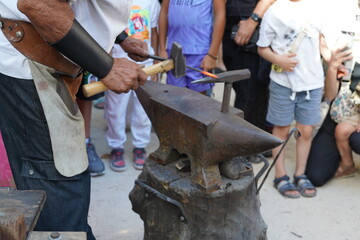 traditional blacksmith handcraft  hammering on anvil
