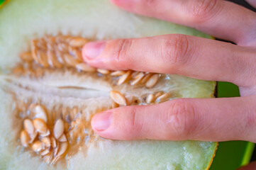 Close-Up of Cut Yellow Melon with Seeds