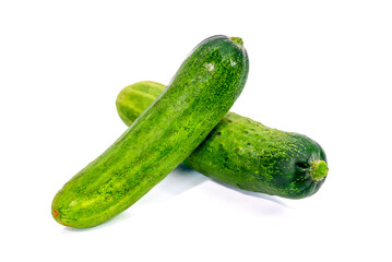 Fresh green cucumber with slices isolated on white background