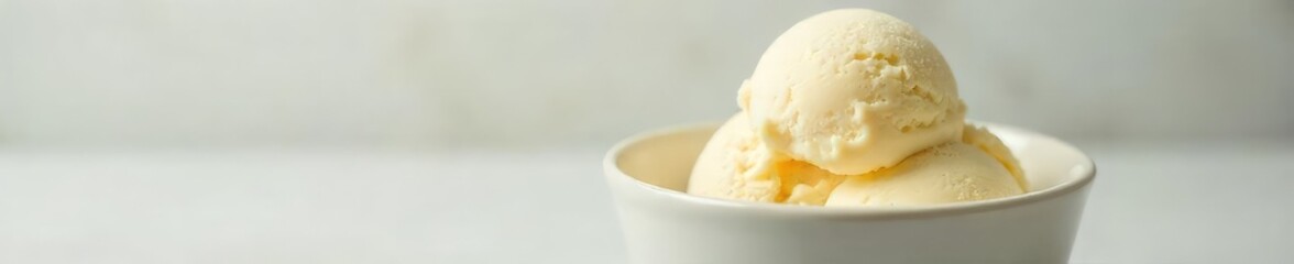 A pristine scoop of vanilla ice cream sits in a classic bowl, ready to be enjoyed The smooth texture and creamy color are vividly displayed against a clean background , dessert, scoop