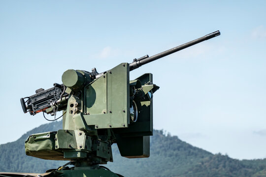 Automatic machine gun on a military armored vehicle