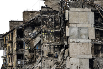 ruined street and destroyed houses the city Kiev war in Ukraine