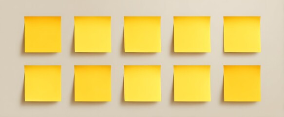 The collection of blank yellow sticky notes on a plain smooth background