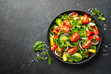 Fresh salad with leaves and vegetables.