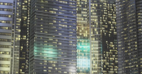 Bright lights adorn tall skyscrapers in a lively cityscape at night. Reflections shimmer on glass surfaces, creating a vibrant urban atmosphere filled with energy and movement.