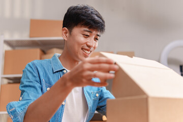 Online seller packing orders for e-commerce shipping in a warehouse