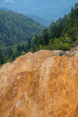 Eroded cliffs of Groapa Ruginoasa in Apuseni, Romania
