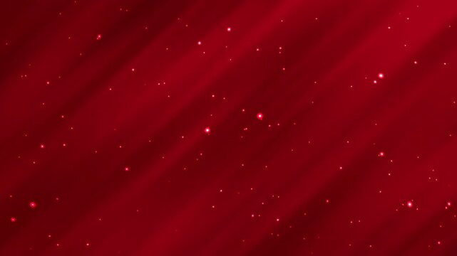 Dynamic red background with streaks and small glitters. Suitable for festive designs, holiday promotions, bold advertisements, and eyecatching graphics.