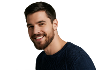 A man with a beard wearing a dark blue sweater smiling