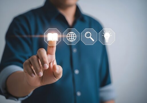 Man touches virtual book icon with finger on digital interface showing globe search and idea bulb