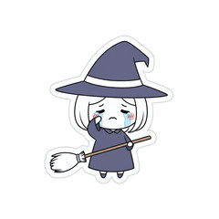 Sad witch crying holding a broomstick