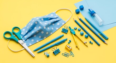 Back to School During Pandemic Blue School Supplies on Yellow Background Covid 19 Face Mask