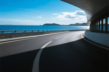 Scenic coastal road with clear blue sky and sea view