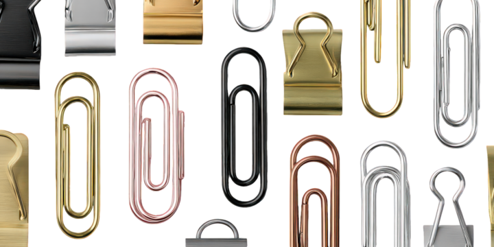Assorted Metallic Paperclips On Black Background