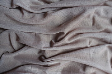 Rippled dull dusky pink unprinted polyester mesh fabric