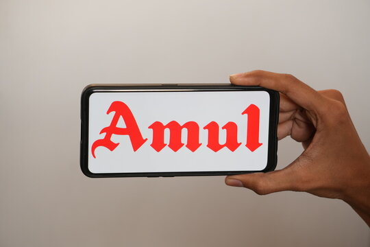 INDIA, DELHI - SEPTEMBER 16, 2025: Amul Logo on Smartphone (Variant)