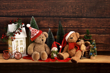 Wooden shelf with  two teddy bears and Christmas decoration in vintage style