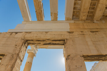 Fototapeta premium Temple at Akropolis, Athens, with blue sky (columns, details of ancient greek building)