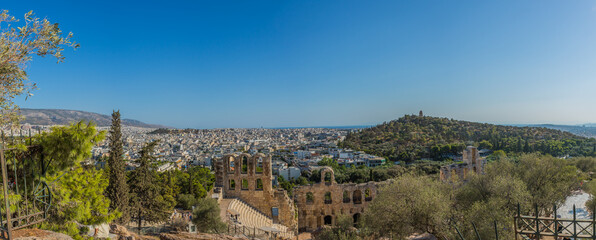 Panoramic view over Athens with ancient theatre Odeon of Herodes Atticus at Acropolis, Athens