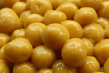 The texture of this traditional food is golden yellow in color and round in shape and is called salak seeds.