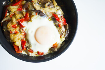 Cooked vegetables with poached egg