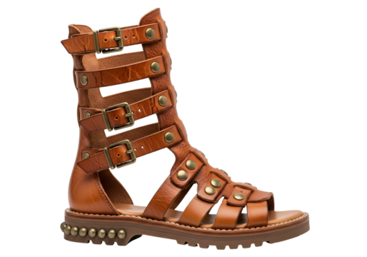 A pair of light brown leather sandals with intricate straps and metal buckles, featuring a chunky platform sole, presents a stylish and durable design.