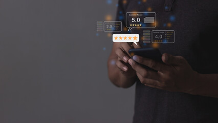 Excellence Review, Young Man hand holding Smart Phone with five star to review and give 5 stars with very good results in service, Good review 5 star rating choice feedback