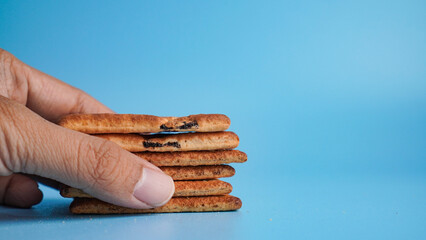 Stacked cookies showing a profit or a building
