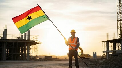 Proud male construction worker holding the flag of Ghana at a building site during a beautiful sunrise, symbolizing national development and industry. - Powered by Adobe