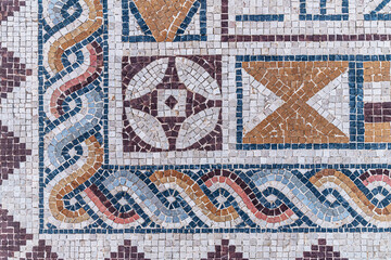 vintage background of floor mosaic in an ancient temple