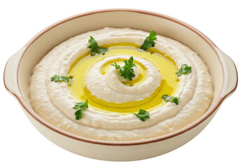 Isolated bowl of hummus garnished with olive oil and parsley on neutral studio setting