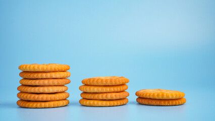 Stacked cookies showing a profit or a building