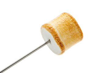 Isolated marshmallow on a skewer, toasted golden-brown for roasting over campfire flames outdoors