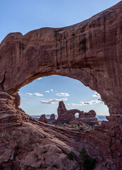 Image of Turret arch seen through North window arch in arches national park, USA © Donald