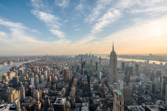 View of New York city during sunset golden hour with clouds and colourful sky