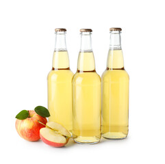 Delicious cider in glass bottles and apples isolated on white