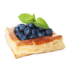 Yummy puff pastry with blueberries and mint isolated on white