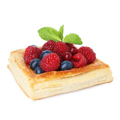 Yummy puff pastry with berries and mint isolated on white