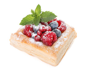 Tasty puff pastry with berries, powdered sugar and mint isolated on white