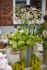 Stalls with flowers and bouquets at local street market