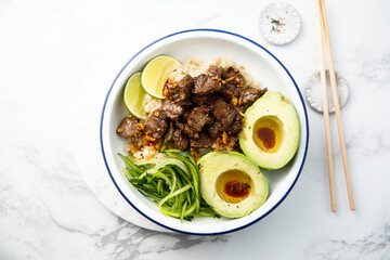Rice with beef and avocado