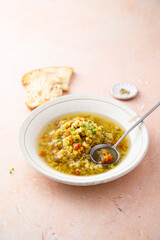 Homemade lentil soup served with microgreens